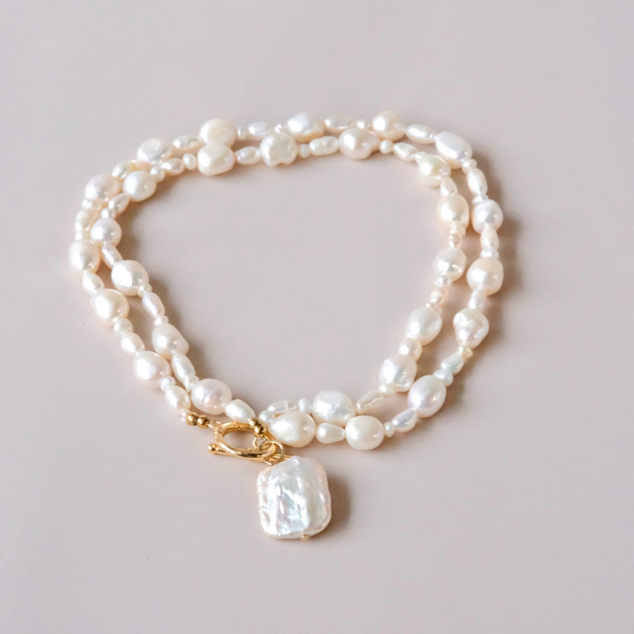 Long pearls necklace with Baroque pearl pendant