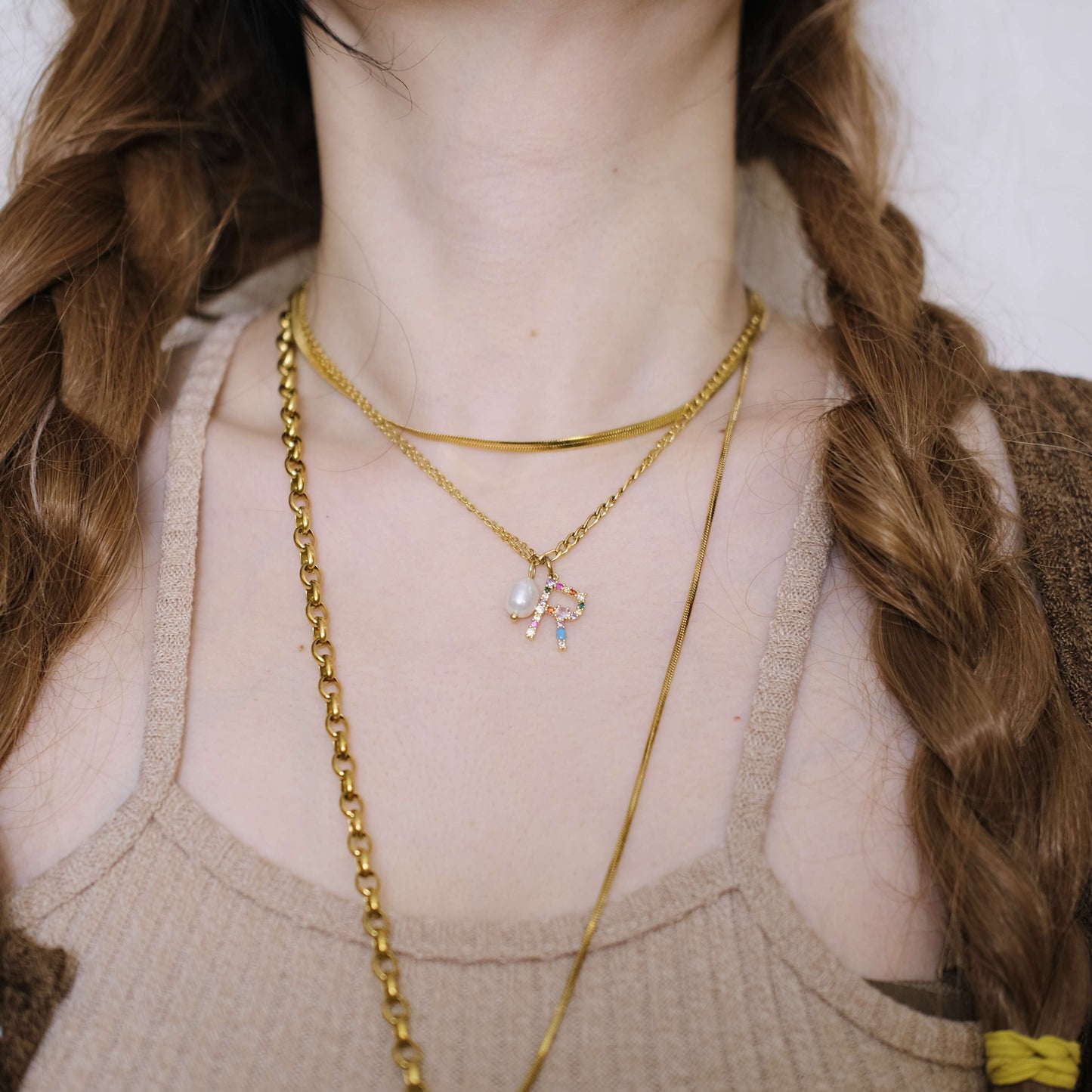 una perla con collar de cadena Gargantilla