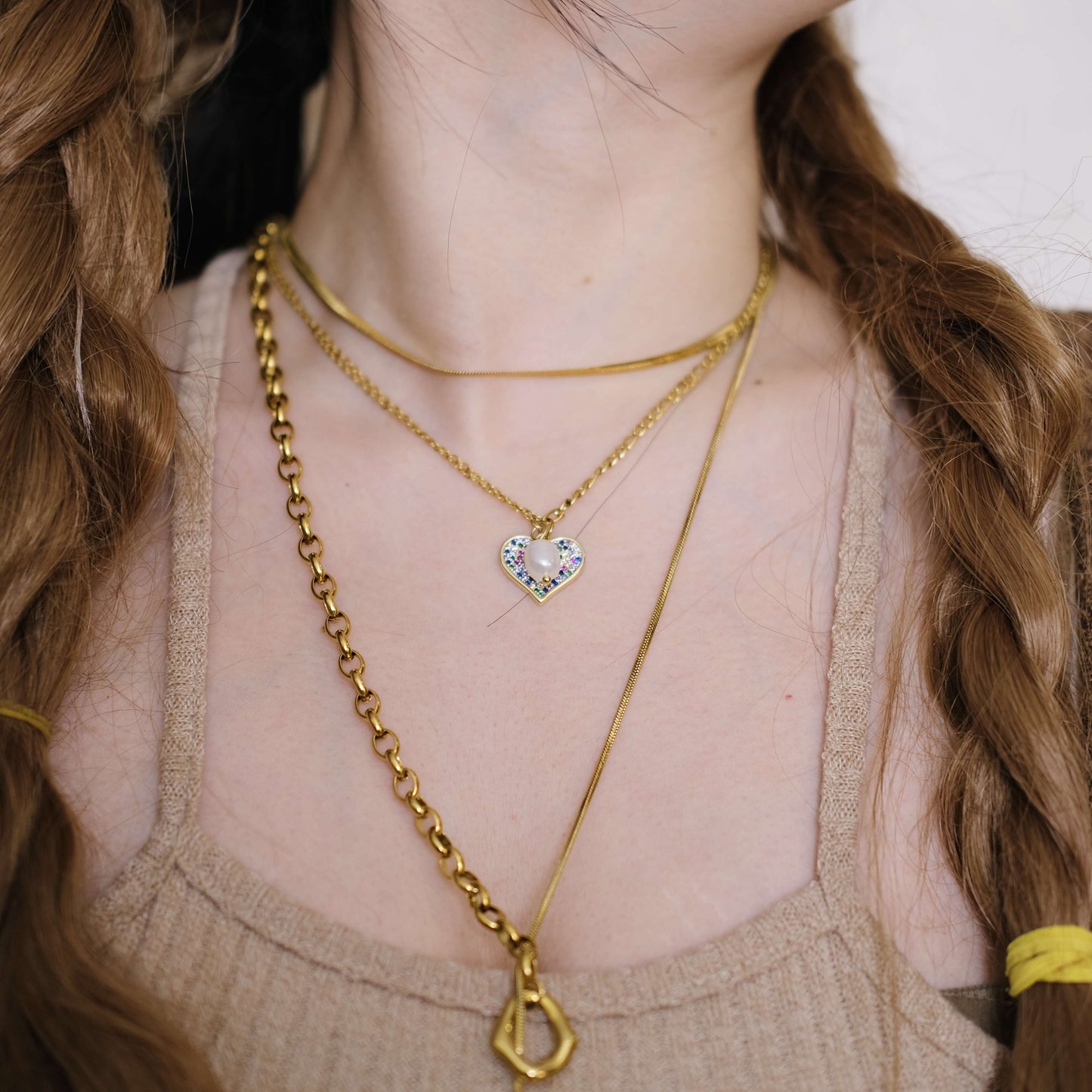 una perla con collar de cadena Gargantilla