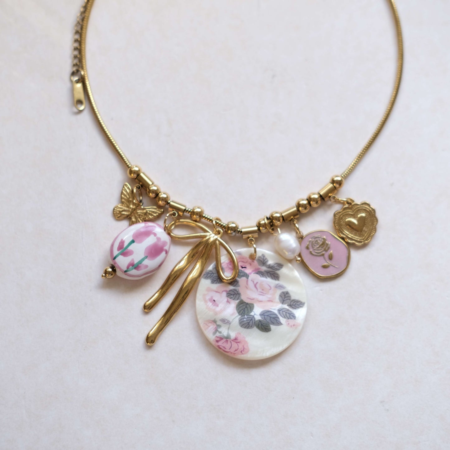 Floral Charm Necklace with Bow & Pearl Accents