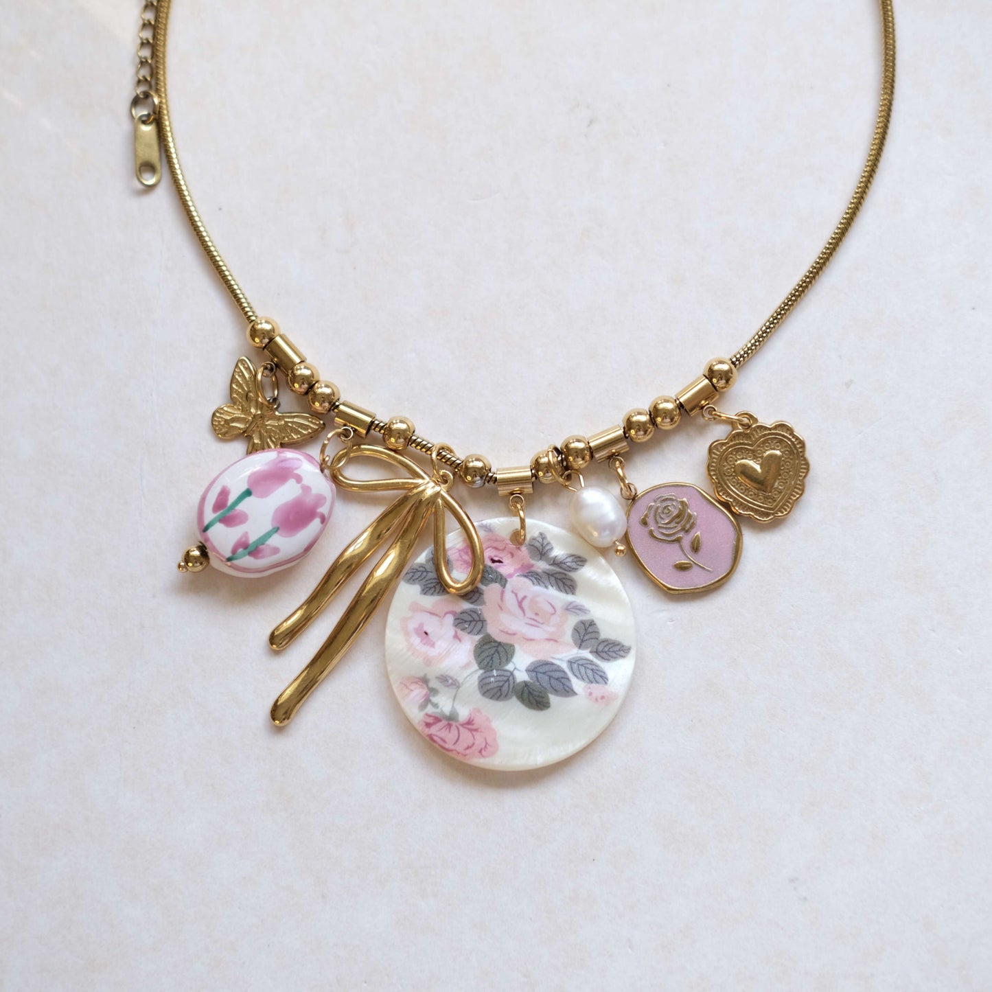 Floral Charm Necklace with Bow & Pearl Accents