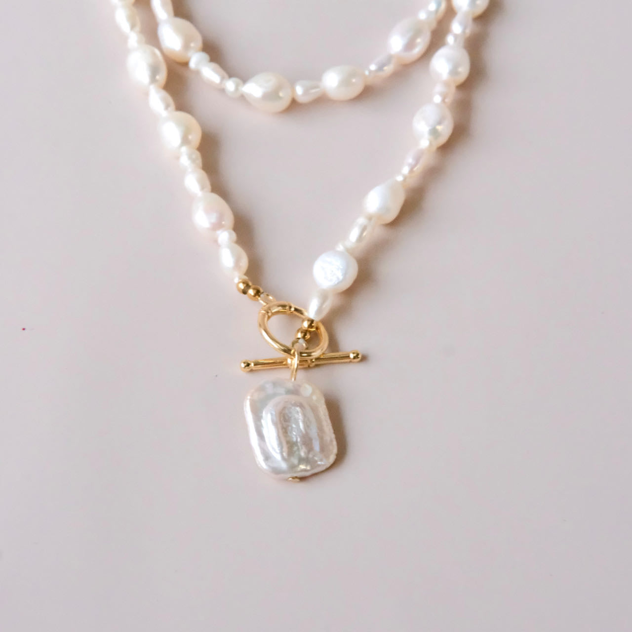 Long pearls necklace with Baroque pearl pendant