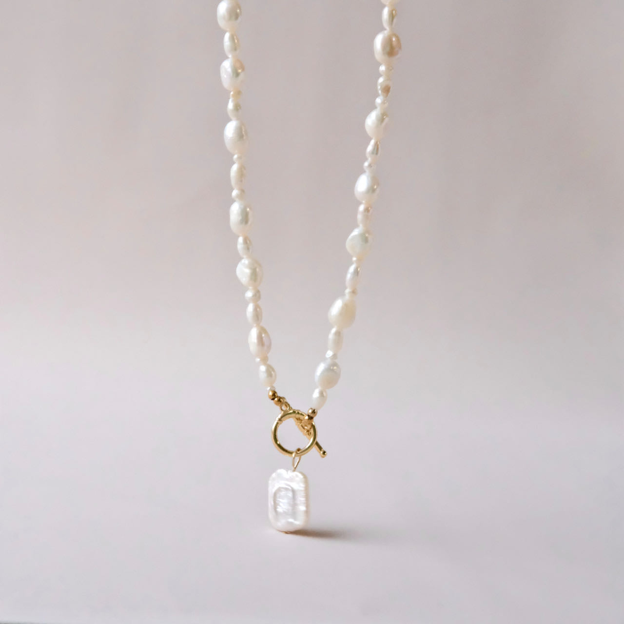 Long pearls necklace with Baroque pearl pendant