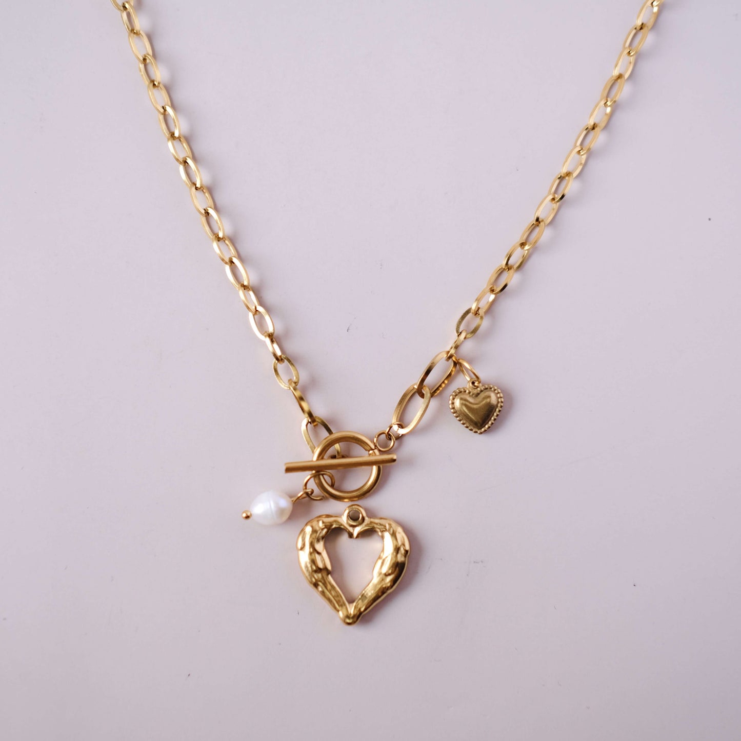 Colgante con dijes intercambiables de corazón vacío